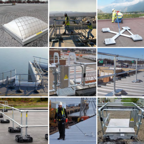 Workers on roof wearing fall protection anchored to safety bars